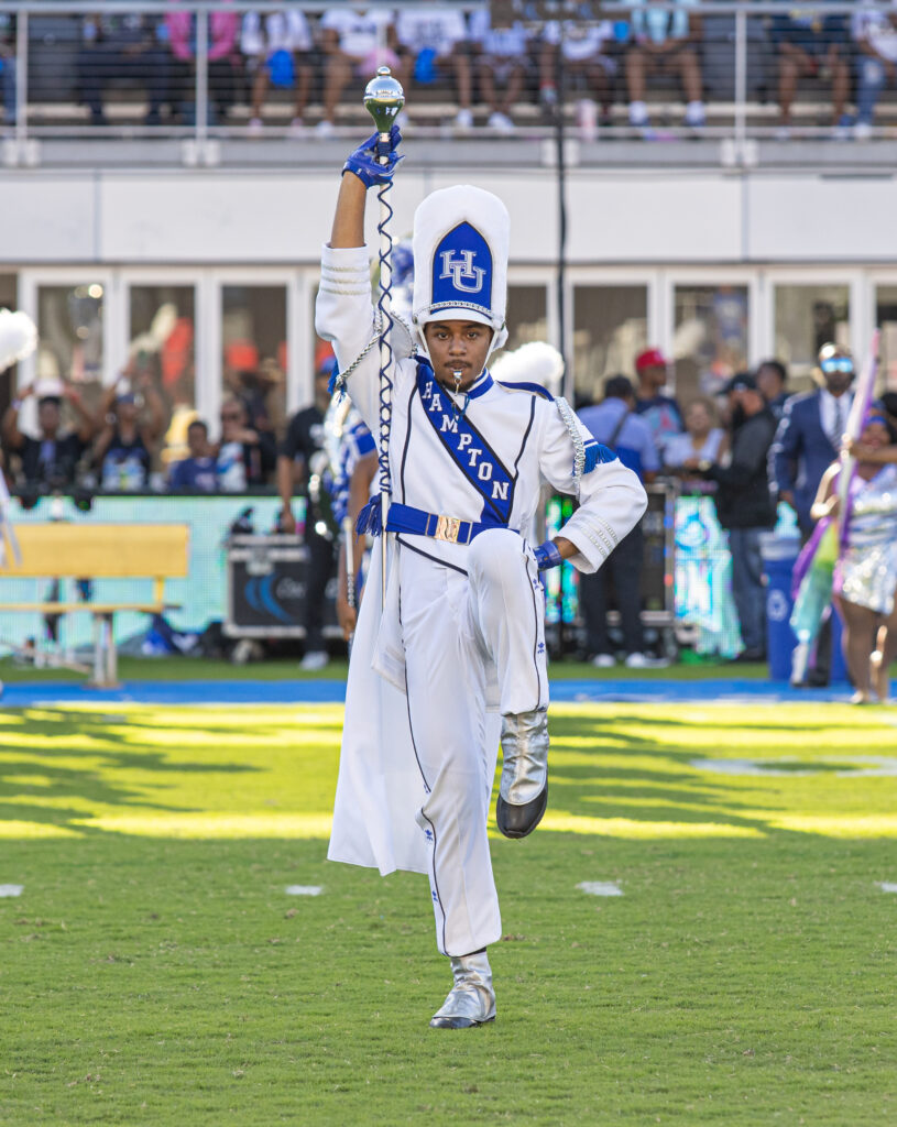 drum major marches on field